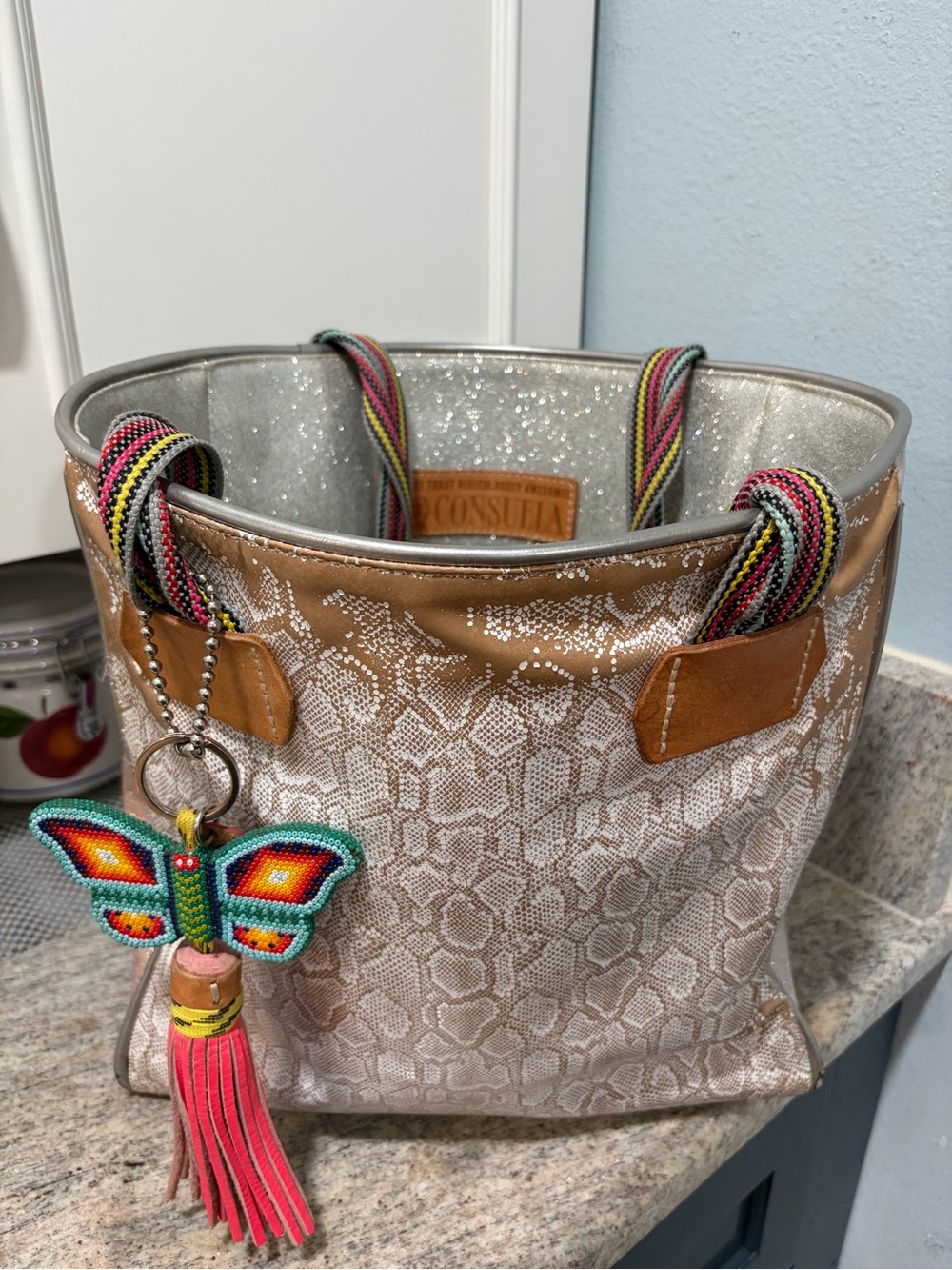 Consuela Tan Metallic Snake-Print Tote with Multicolor Strap and Butterfly Charm